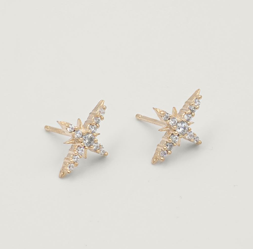 Taara 18 Carat Gold and White Topaz Star Stud Earrings