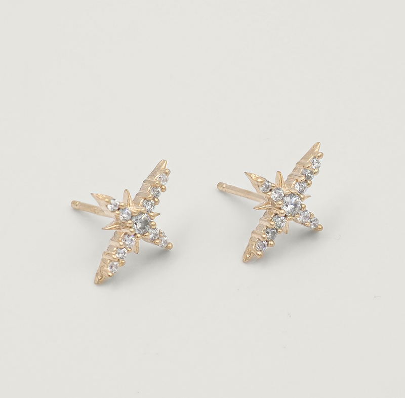 Taara 18 Carat Gold and White Topaz Star Stud Earrings