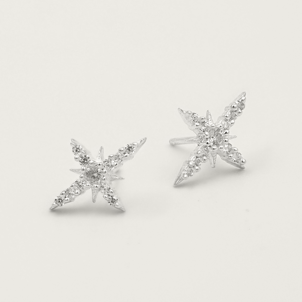 Taara 18 Carat Gold and White Topaz Star Stud Earrings