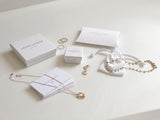 Rose Gold Starburst Pave White Topaz Earrings