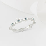 Aura Blue Topaz and Silver Eternity Ring Band