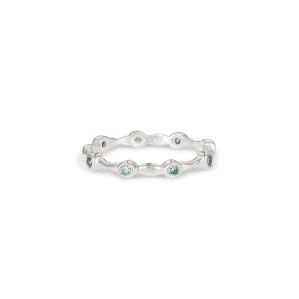 Aura Blue Topaz and Silver Eternity Ring Band